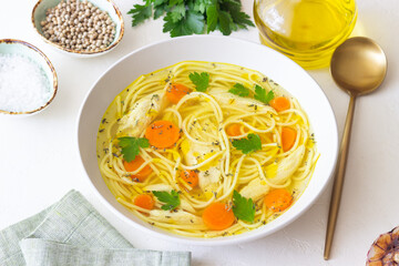 Noodle soup with chicken, carrots and greens. Healthy eating. Diet.