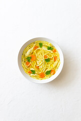 Noodle soup with chicken, carrots and greens. Healthy eating. Diet.