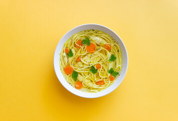 Noodle soup with chicken, carrots and greens. Healthy eating. Diet.