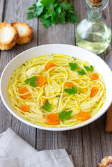 Noodle soup with chicken, carrots and greens. Healthy eating. Diet.