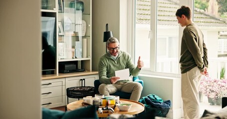 High five, dad and child with good grades, home or celebration for report card, happy and education. Success, man and motivation for son with scholarship opportunity, family and test results in house