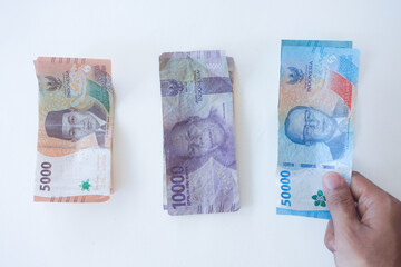 Businessman count and manage budget money for investment, saving, expense, account and financial...