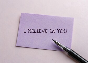 note saying i believe in you on soft purple