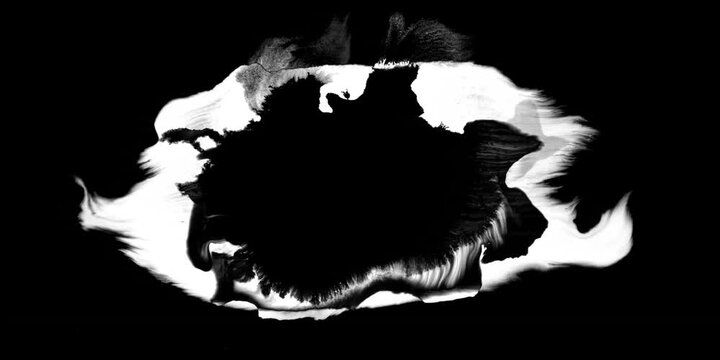 Black ink drop on white background