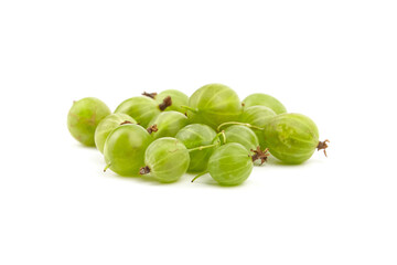 Fresh green gooseberries scattered on a white surface, showcasing their round shape, smooth texture, and vibrant color, perfect for culinary use or healthy snacking ideas