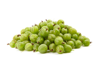 Fresh green gooseberries piled together, showcasing their round shape and smooth texture, highlighting the vibrant color and natural beauty of this delicious fruit