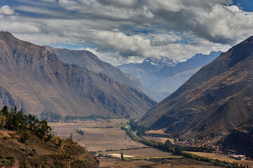 the Sacred Valley-Cusco, unfolds in all its majesty — a living tapestry of ancient terraces,...