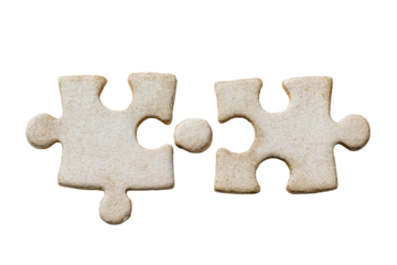 Two light beige puzzle pieces joined