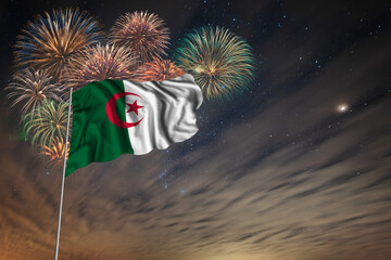 Waving National flag of Algeria and holiday fireworks
