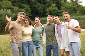 Team building. Group of happy people together outdoors