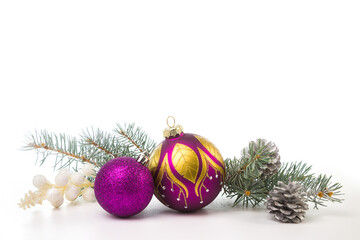 Christmas card with fir branches and Christmas decorations. Copy space.