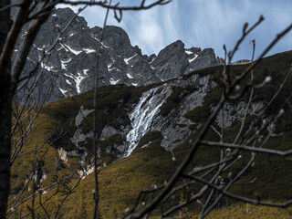Alpine Waterfall Formed by Glacial Melt in Roztoka Valley