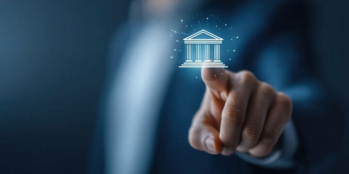 Hand Touches Digital Bank Building Icon on a Screen Interface