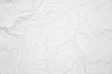 White crumpled paper texture background. Abstract blank wrinkled page or wall surface for design, banner, and poster mockup with copy space.
