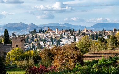 Granada town in Spain from the Alhambra complex. Panoramic view of a city nestled on a hillside...