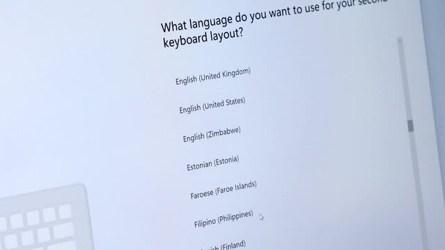Computer screen shows What language do you want to use for your second keyboard layout offering diverse English regions for software setup and user customization