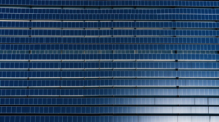 Aerial View of Solar Farm with Rows of Photovoltaic Panels Producing Clean Renewable Energy