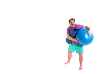 Funny fat man doing fitness. Fitness ball and training.