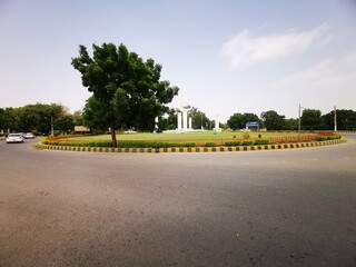 roundabout with trees and blue sky