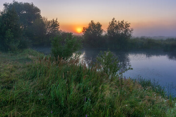 Fototapeta premium morning mist over the river