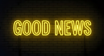 Obraz premium A glowing yellow neon sign displaying the words good news against a brick wall background image
