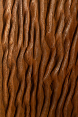 Wooden panel with textures and grooves