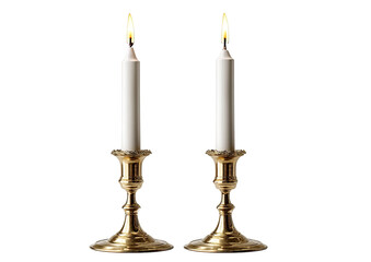 Two gold candle holders, each with a white candle