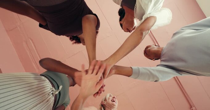 Applause, huddle and palm with women in studio together for health, wellness or yoga from below. Fitness, stack of hands and success with group of friends in circle for energy, excitement or pilates