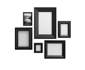 Black picture frames in a gallery wall arrangement.  Several empty frames, one with a grayscale image, are grouped on a dark background