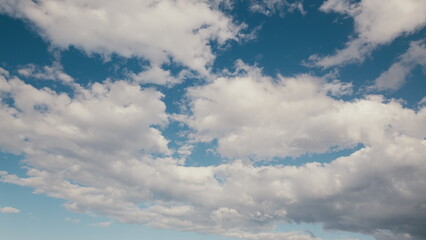 A Captivating Blue Sky with Fluffy Clouds for Ultimate Relaxation and Inspiration