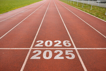 Start of new year. Changes of year 2025, 2026, 2027 on Running track. Concept of new ideas starting...