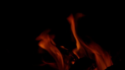 The Captivating Flames Dance Gracefully in the Dark of Night, Creating a Hypnotic Visual