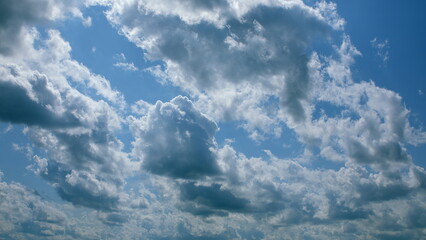 A beautiful and scenic cloudy sky with a vibrant blue atmosphere pleasantly overhead