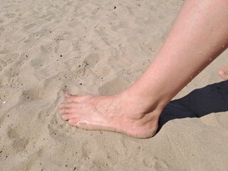 feet on the beach