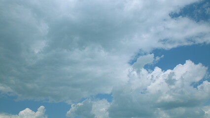 A Dynamic and Cloudy Sky Showcasing Beautiful Shades of Blue and Dramatic Atmosphere View