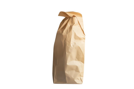 Brown paper bag standing upright isolated on transparent background. Brown paper bag standing upright isolated on white background.