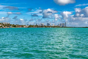 A stunning panoramic view of Sunny Isles Beach, Miami, with its modern skyline rising from the...