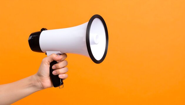 Hand Holding White Megaphone on Vibrant Orange Background
