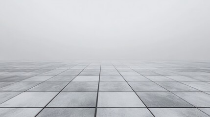Empty gray tile floor perspective