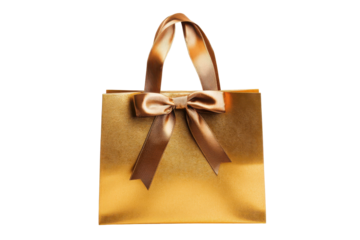 Golden gift bag with bow isolated on transparent background. Stylish golden shopping bag with elegant ribbon handles isolated on white background.