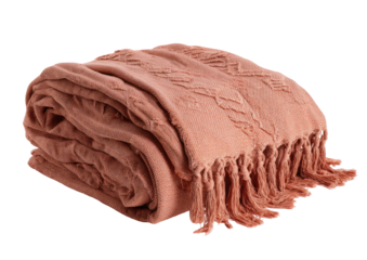 Folded, coral-colored blanket with textured design and fringe