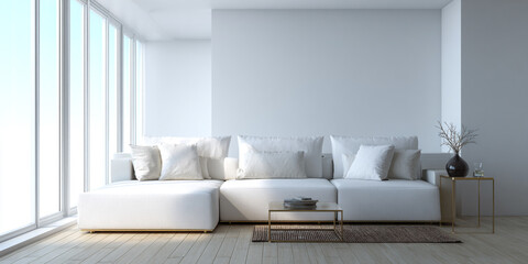 Modern white sectional sofa with large windows and minimalist decor pillows