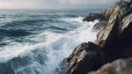 Fototapeta premium Powerful waves crashing against a rugged rocky coastline
