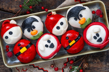 Festive vegetarian bao buns stuffed with vegetables - Christmas themed food © beataaldridge