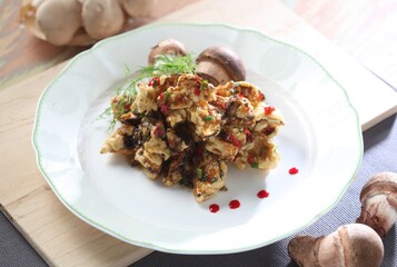 Crispy deep-fried pine mushrooms tossed in sweet soy glaze. Rich in protein and fiber. A dish by Master Chef Hanshunseop. Photographed in Korea.