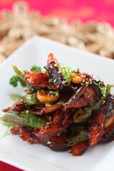 Protein-rich anchovy and pine mushroom stir-fry with sweet soy glaze. Nutritious and savory. A dish by Master Chef Hanshunseop. Photographed in Korea.