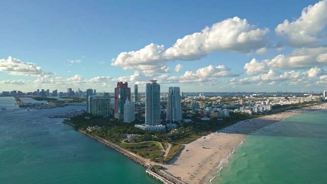 Summer in Miami from drone. Miami beach coastline. Panoramic view of Luxury condos in Miami Beach Florida. Aerial View of Surfside Miami Beach.
