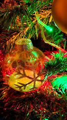 Christmas tree decorated with beautiful transparent ball with ab