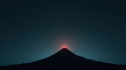 Dark night sky, volcano peak glows red