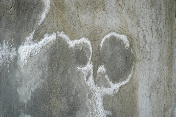 Rough, textured concrete wall details with distinctive white stains caused by efflorescence or salt deposits. Natural grunge and abstract patterns formed by weathering and mineral deposits.